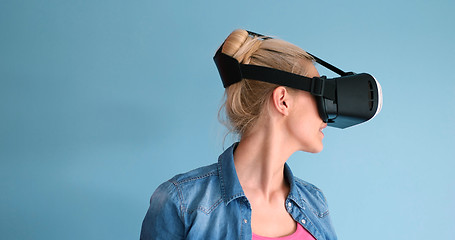 Image showing woman using VR headset glasses of virtual reality