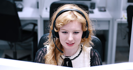 Image showing female call centre operator doing her job