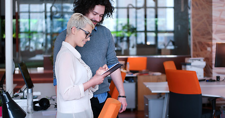 Image showing Business People Working With Tablet in office