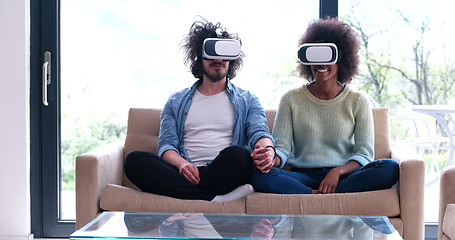 Image showing Multiethnic Couple using virtual reality headset