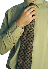 Image showing Man Adjusting His Tie