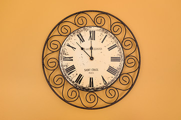 Image showing Vintage style round clock on the wall