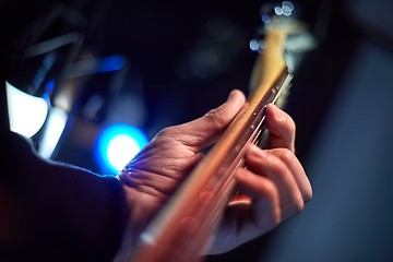 Image showing Guitarist playing live