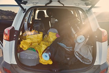 Image showing Trunk with stuff for camping