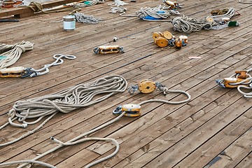 Image showing Sailing boat roaps on a deck