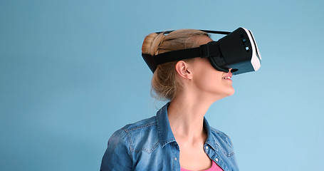 Image showing woman using VR headset glasses of virtual reality