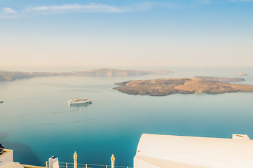 Image showing The beautiful white village Fira and vie to the Nea Kameni,