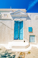 Image showing Typical blue door in Emporio on the island of Santorini, Greece,