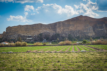 Image showing Panoramic view to the caves in mountains in motion.