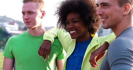 Image showing Portrait of multiethnic group of young people on the jogging