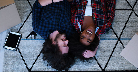 Image showing Top view of attractive young multiethnic couple