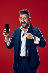 Image showing Handsome businessman with mobile phone