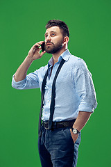 Image showing Handsome businessman with mobile phone