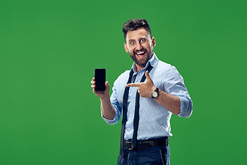 Image showing Handsome businessman with mobile phone