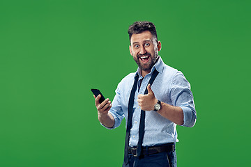 Image showing Handsome businessman with mobile phone