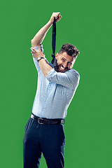 Image showing Man trying to hang himself out of frustration