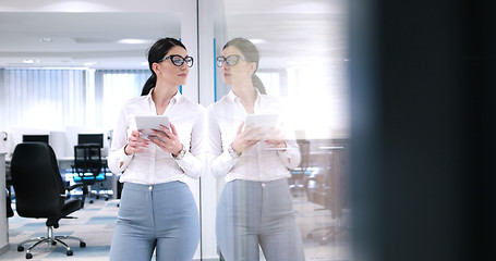 Image showing Business Woman Using Digital Tablet in front of Office