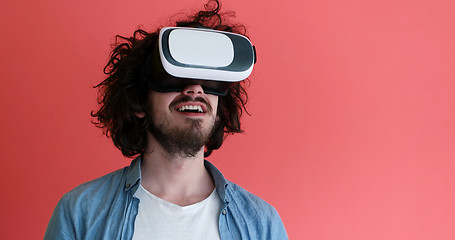 Image showing young man using VR headset glasses of virtual reality