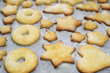 Image showing traditional sweet Christmas cookies on a baking sheet