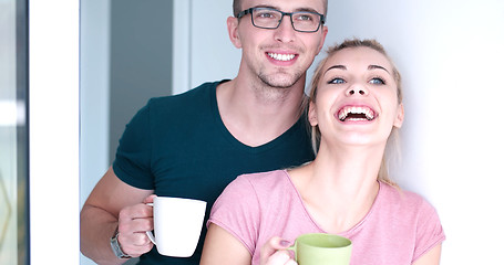 Image showing young couple enjoying morning coffee
