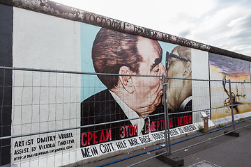 Image showing The famous Fraternal kiss graffiti: My God, Help Me to Survive This Deadly Love by Dmitri Vrubel on the Berlin Wall in Berlin, Germany.