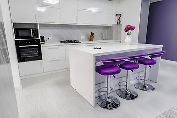 Image showing white dining table in modern kitchen
