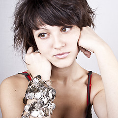 Image showing Brunet woman with bracelets.