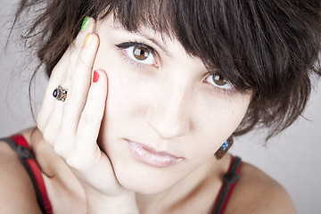 Image showing Brunette lady with bracelets.