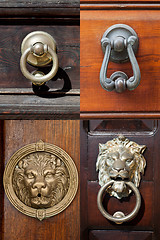 Image showing Ancient italian door knockers and handles.