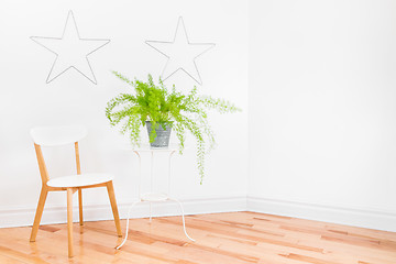 Image showing Bright room corner with simple furniture and Asparagus fern plan