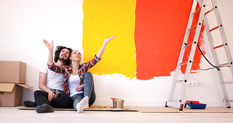 Image showing Happy young couple relaxing after painting