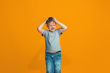 Image showing The squint eyed teen boy with weird expression