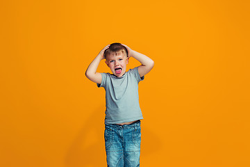 Image showing The squint eyed teen boy with weird expression