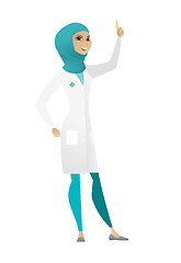 Image showing Muslim doctor pointing with her forefinger.