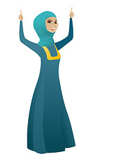 Image showing Business woman standing with raised arms up.