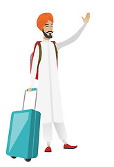 Image showing Young hindu traveler waving his hand.