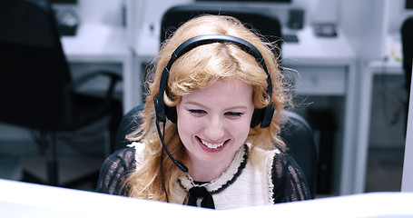 Image showing female call centre operator doing her job