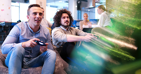 Image showing Office Workers Playing computer games