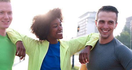 Image showing Portrait of multiethnic group of young people on the jogging