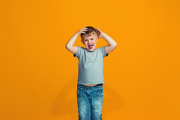 Image showing The squint eyed teen boy with weird expression