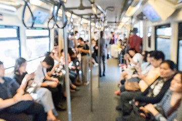 Image showing Blured image of unrecognizable asian people commuting by city subway.