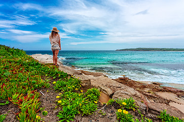 Image showing Female admires beautiful Australian beach in summer