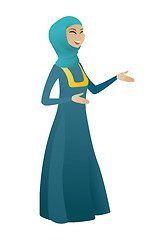 Image showing Young muslim happy business woman gesturing.