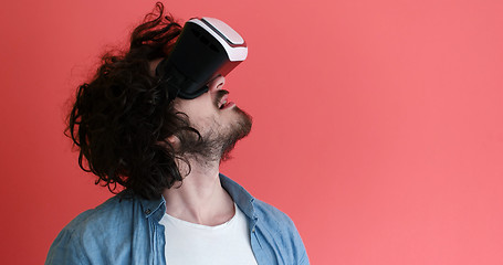 Image showing young man using VR headset glasses of virtual reality