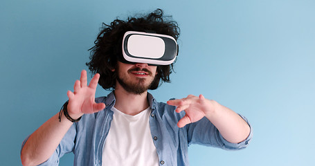 Image showing man using VR headset glasses of virtual reality