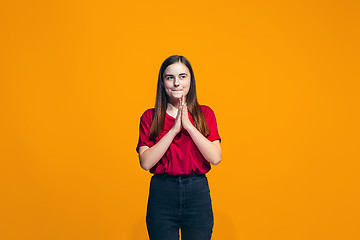 Image showing Young serious thoughtful teen girl. Doubt concept.