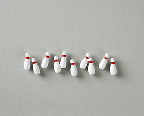 Image showing bowling pins on grey background