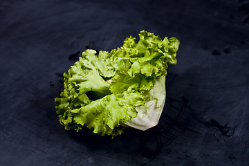 Image showing Fresh green lettuce salad.