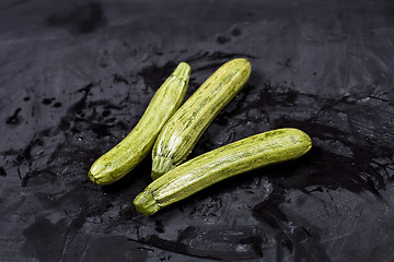 Image showing Fresh green wet zucchini.