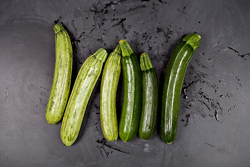 Image showing Fresh green wet zucchini.